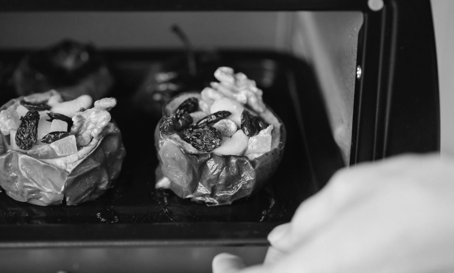 Culinary student practicing advanced plating techniques